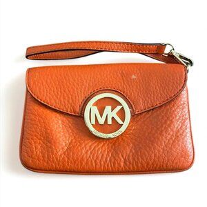 MICHAEL KORS SOFT PEBBLED GENUINE LEATHER MK LOGO WRISTLET in Tangerine